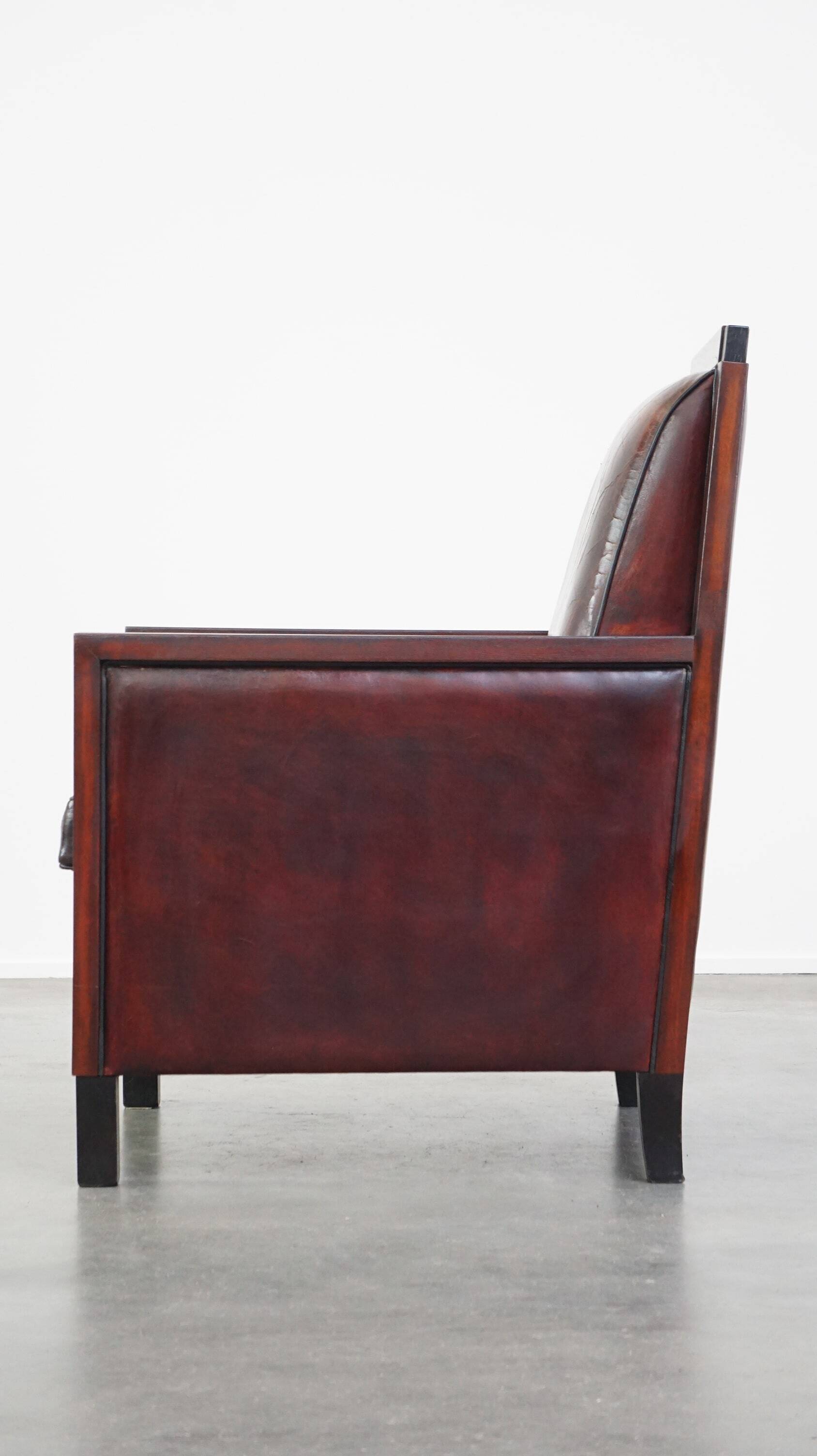 Sheepskin Art Deco design armchair combined with wood