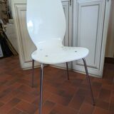 White plexiglass chair