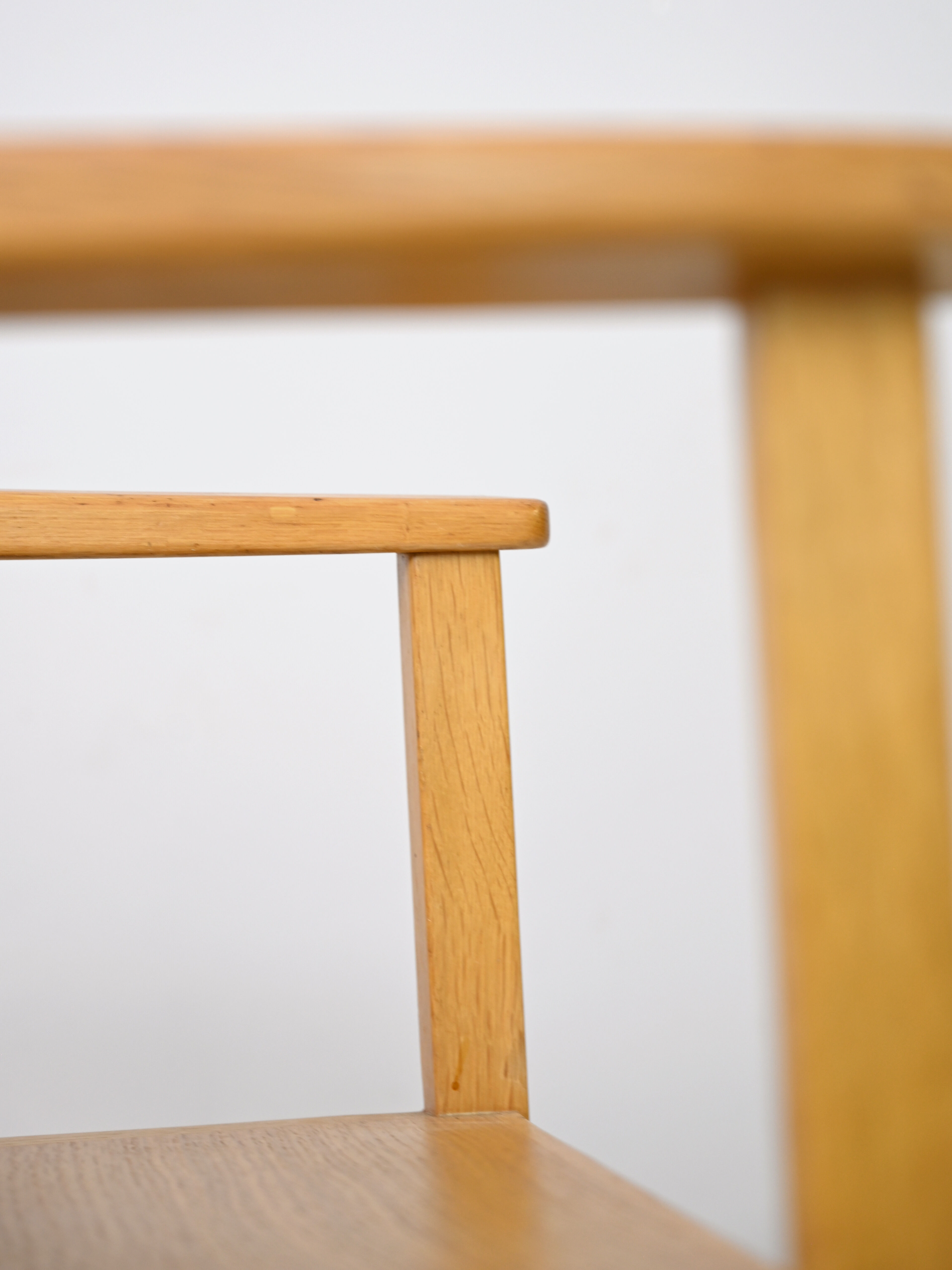 Wooden chair with armrests