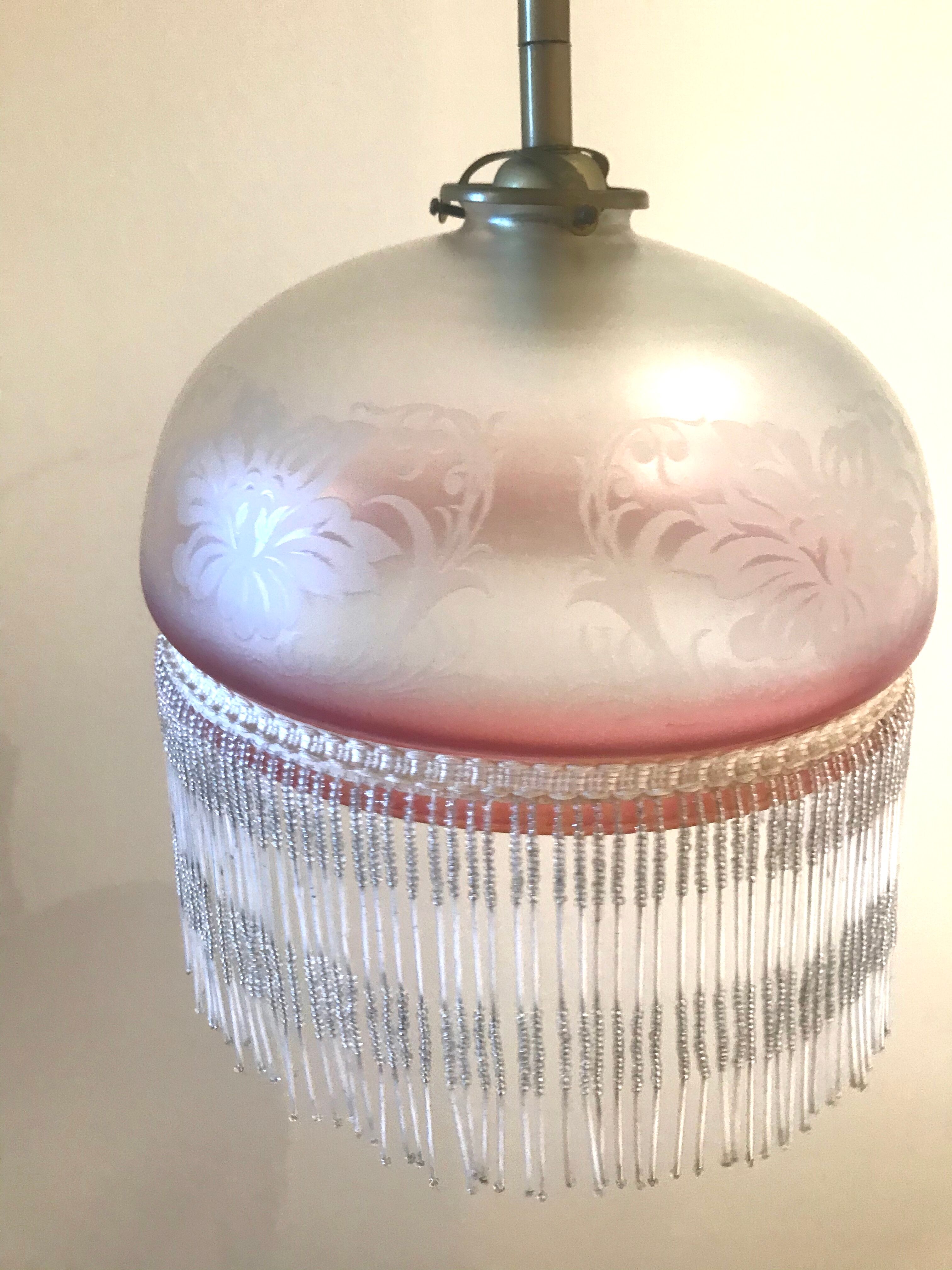 Hanging glass and stamps