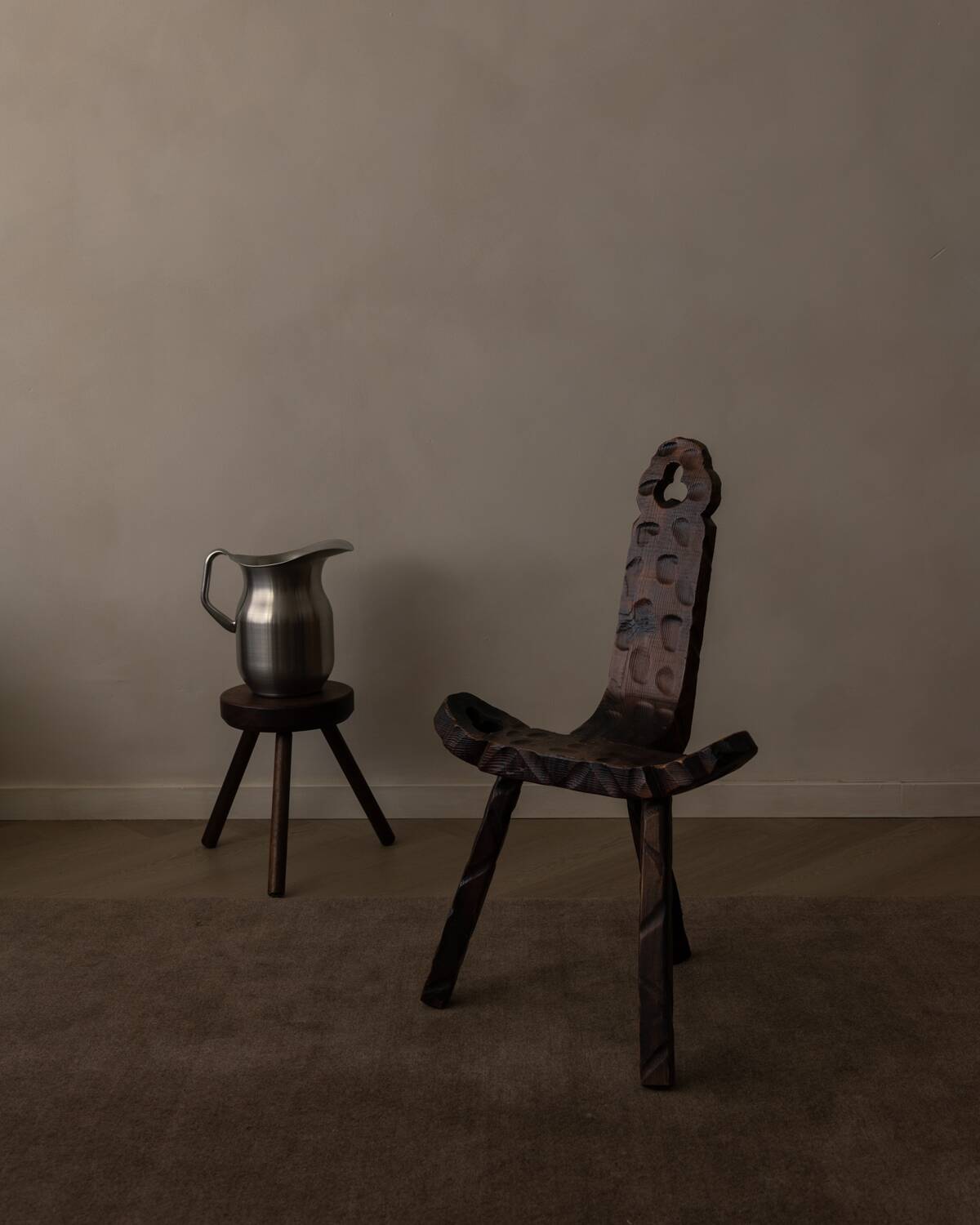 Spanish brutalist tripod chair in carved solid wood