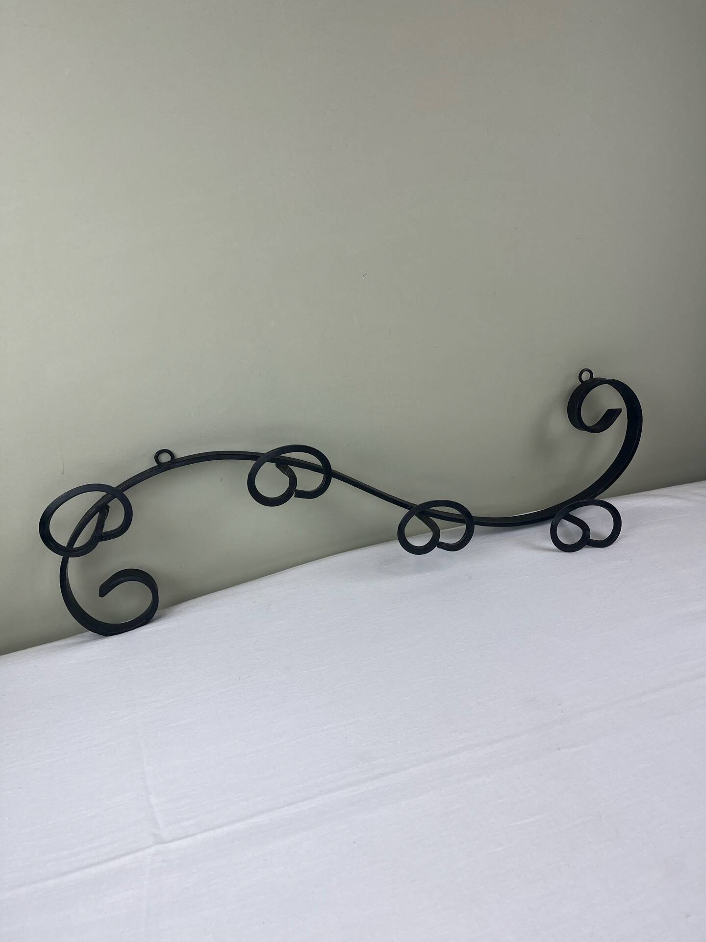 Wrought iron coat rack