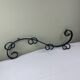 Wrought iron coat rack
