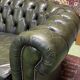 Chesterfield 2-seater green leather sofa from the 1980s