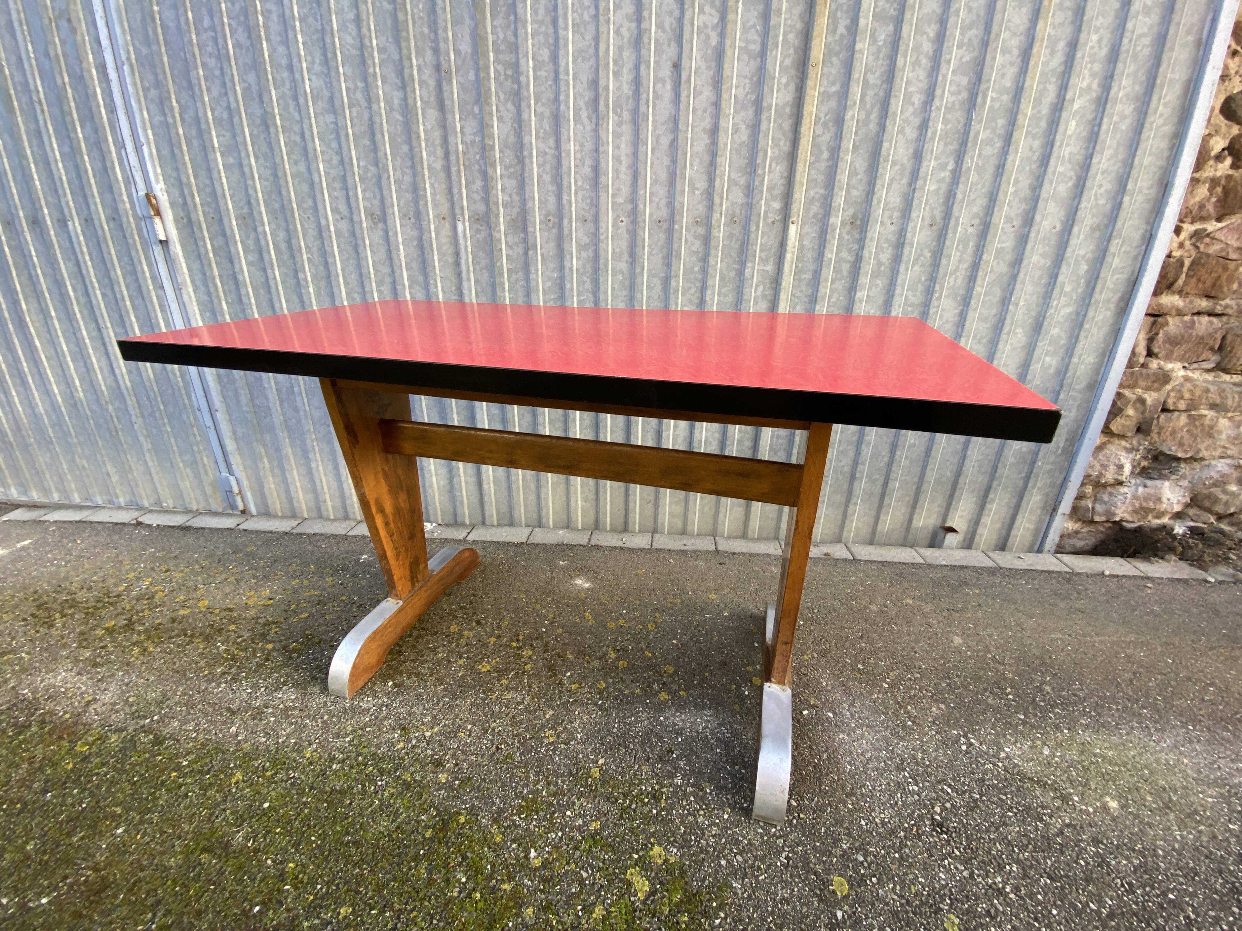 Art deco bistro coffee table covered in formica 1950