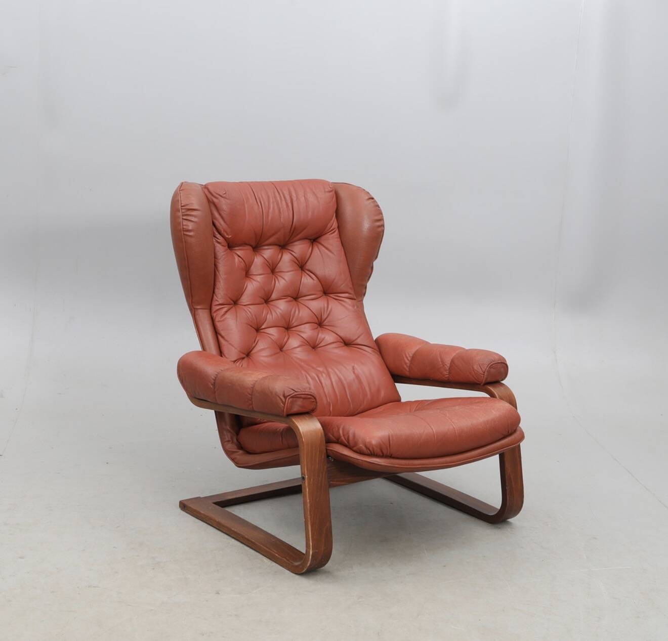 Sculptural Ear-Back Lounge Armchair — Moulded Wood — Deep Button