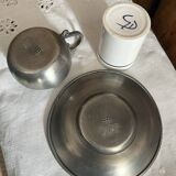 Pewter and porcelain cup and saucer