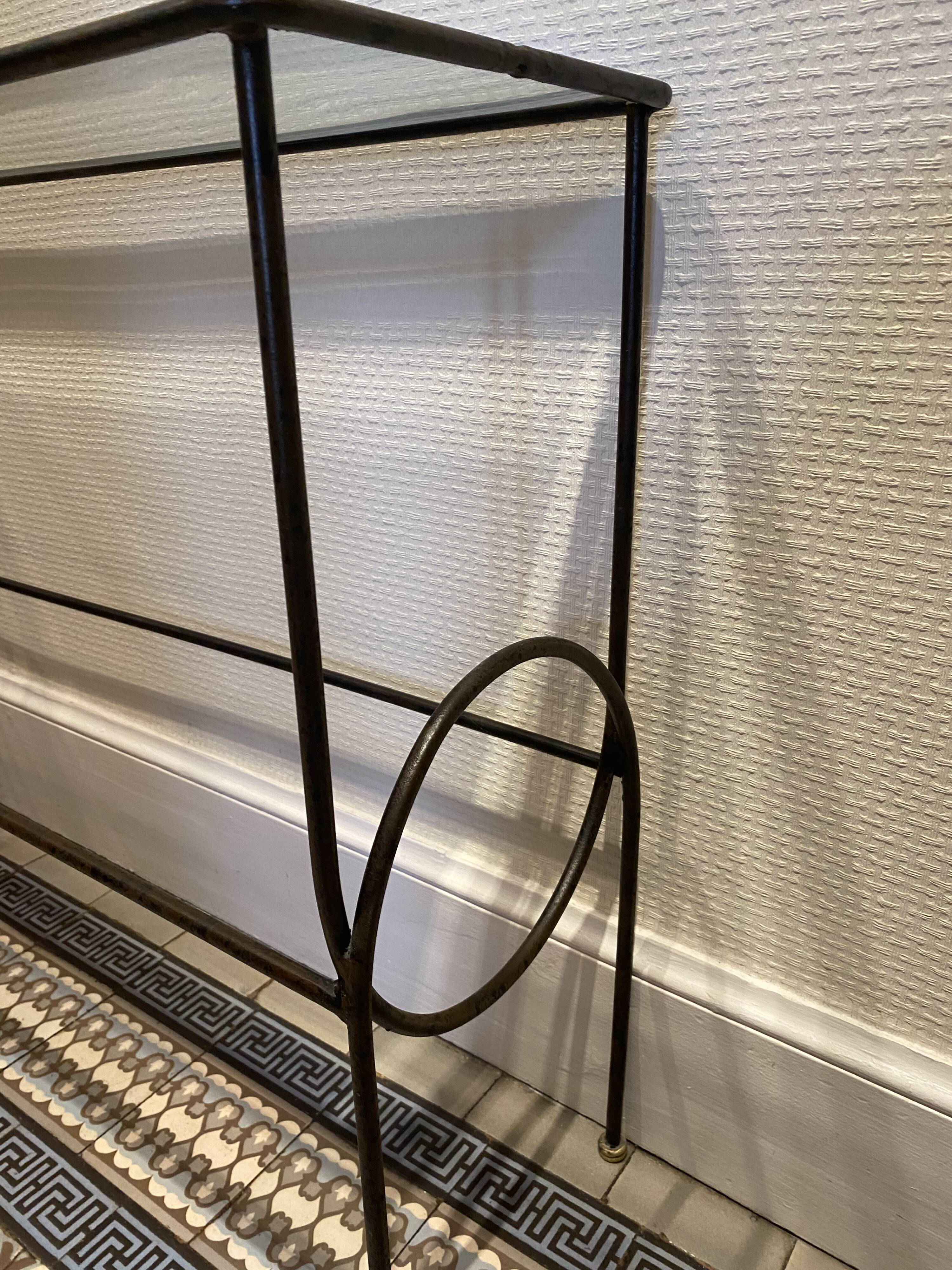 Green console and wrought iron