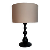 Table lamp in black lacquered turned wood.