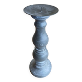 Candle holder in patinated wood