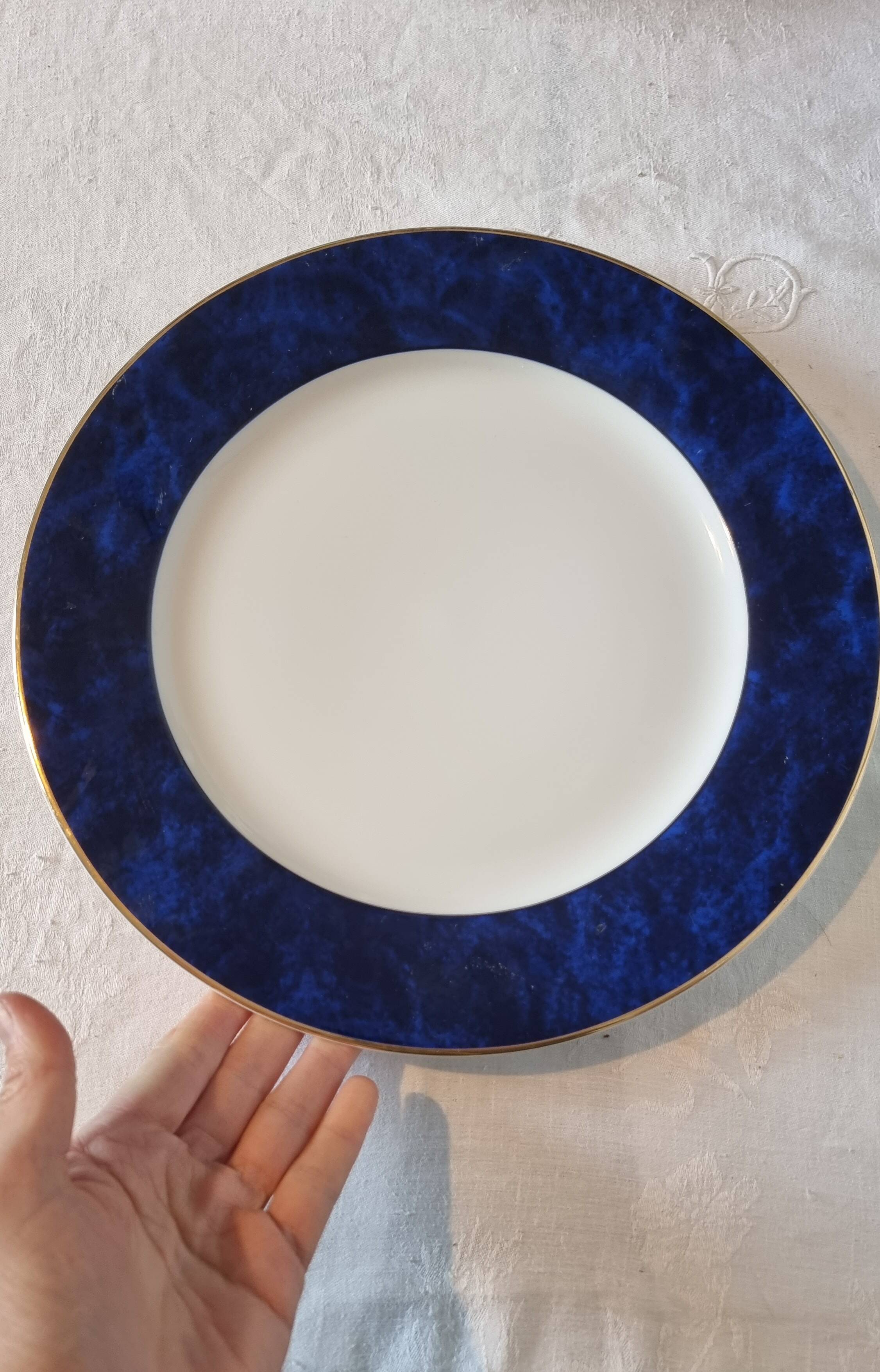 18-piece porcelain dinnerware set from Limoges by Philippe Deshoulières.