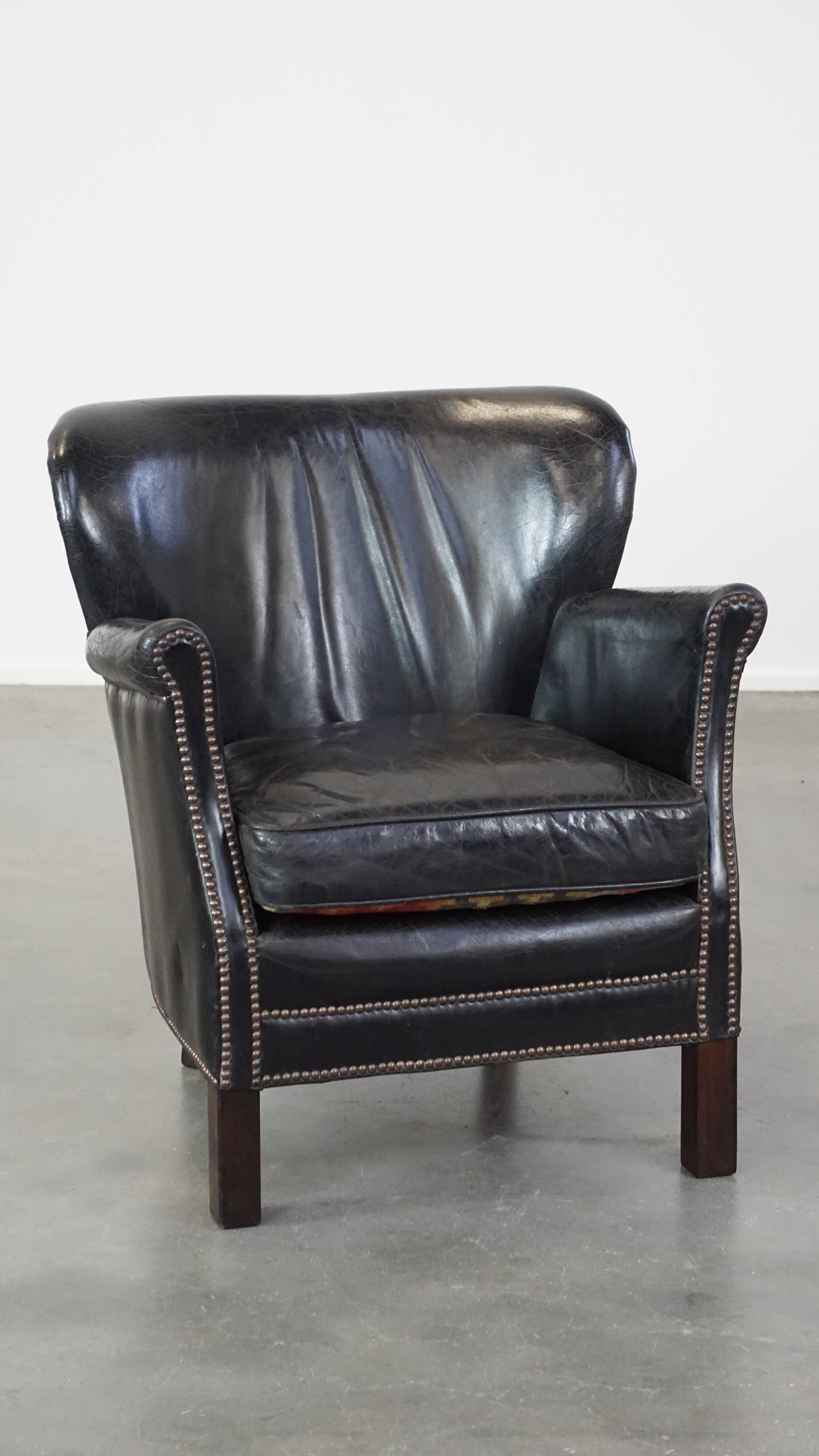 Fauteuil en cuir de vachette noir