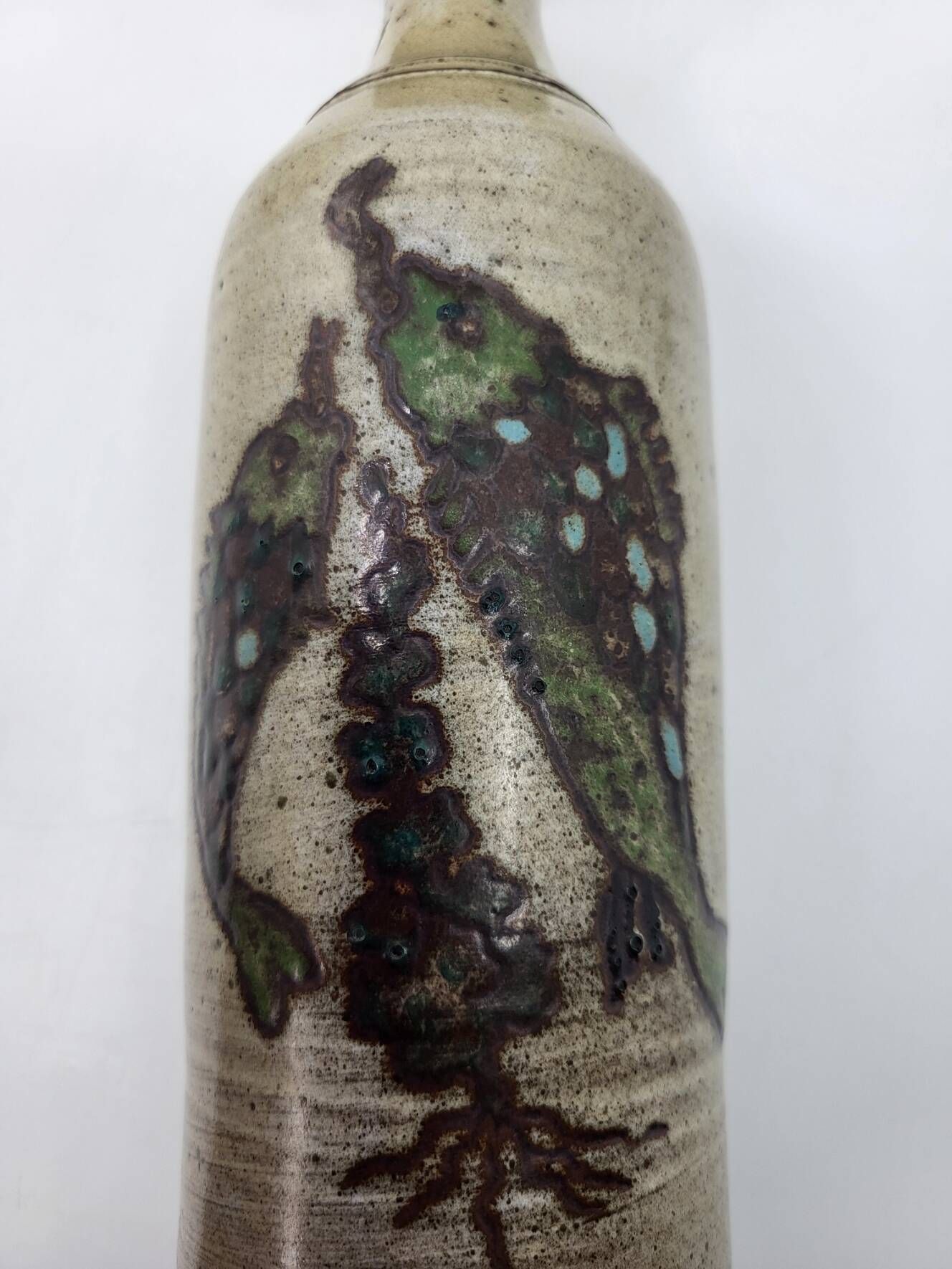 Vintage bottle vase in ceramic stoneware with fish decoration circa 1970/80.