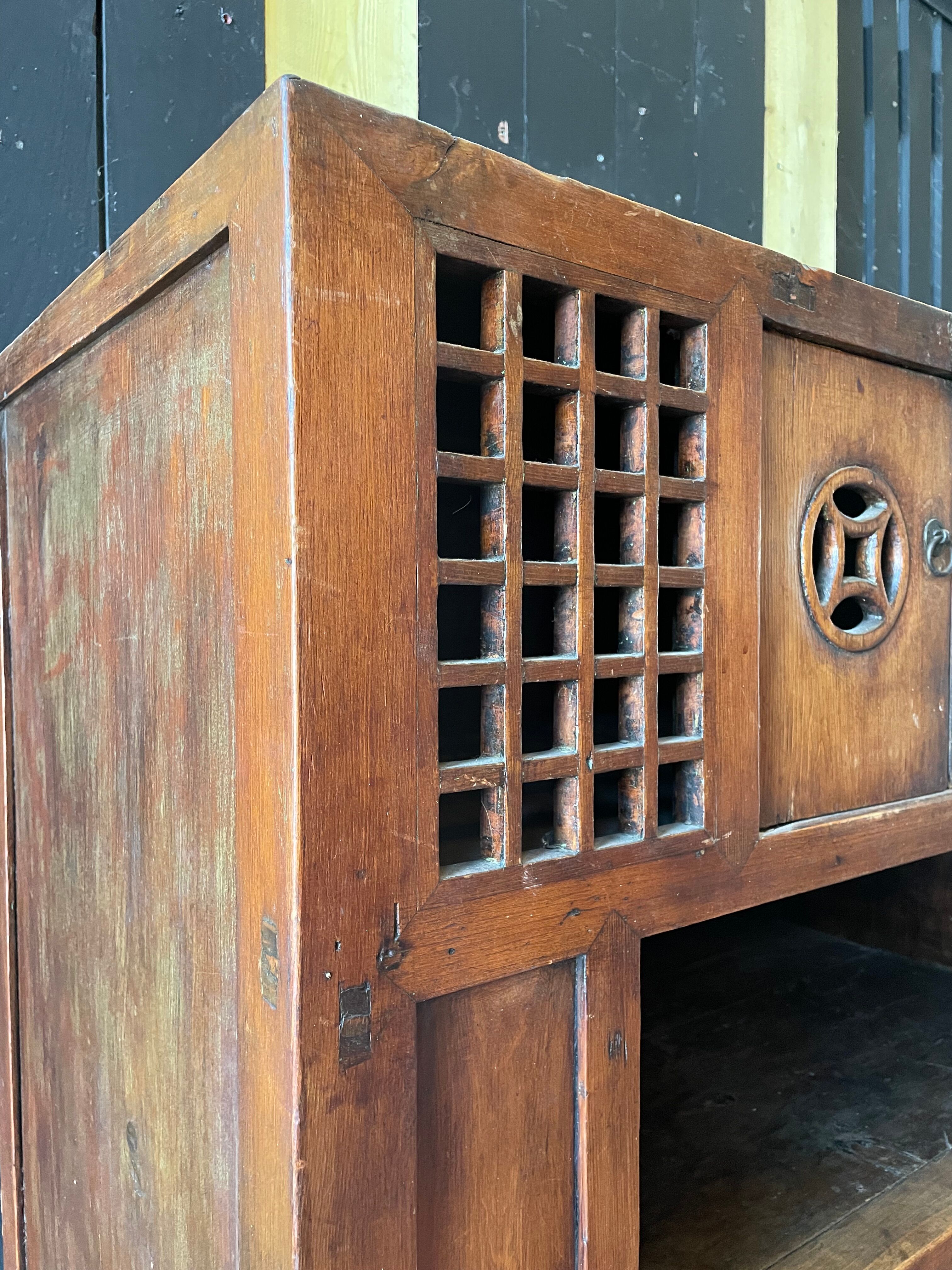 Chinese vessel cabinet 19th century in elm wood