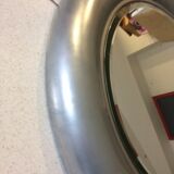 Vintage bright round bathroom mirror in metal