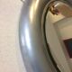 Vintage bright round bathroom mirror in metal