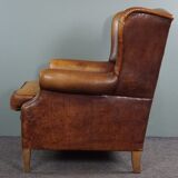 Armchair in patinated sheepskin leather