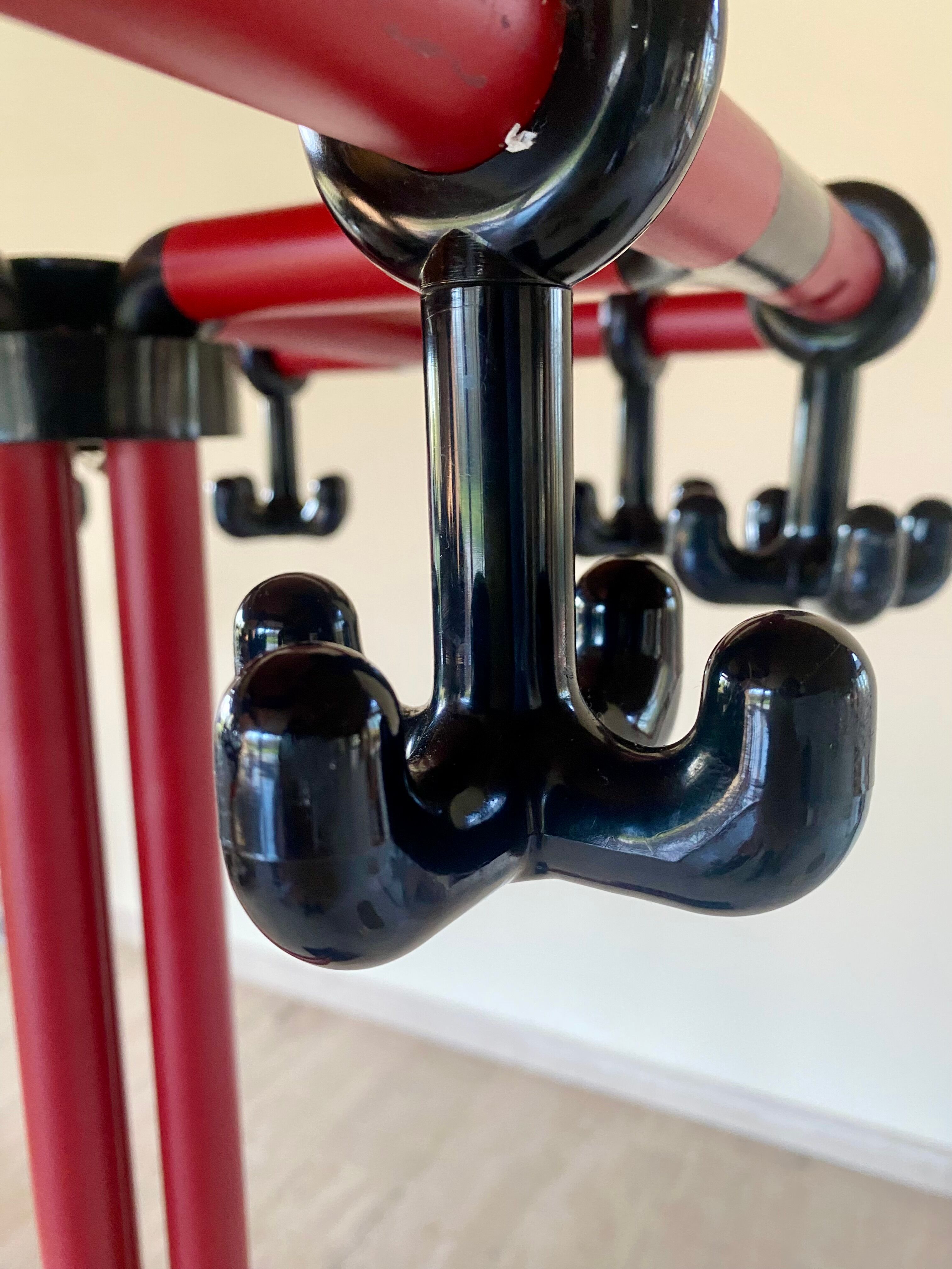 Red and black coat rack design 1980s