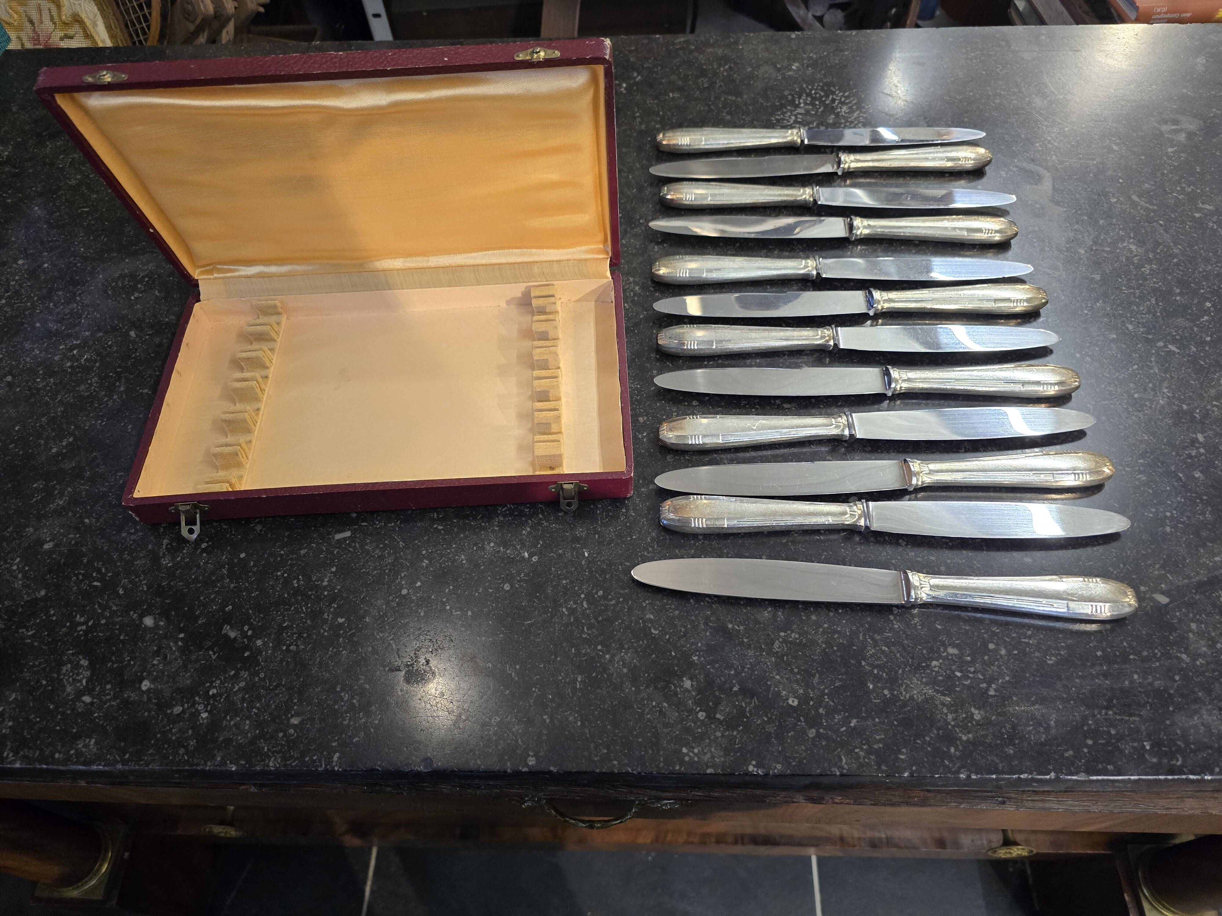 12 Art Deco knives in silver metal mid-20th century with its box
