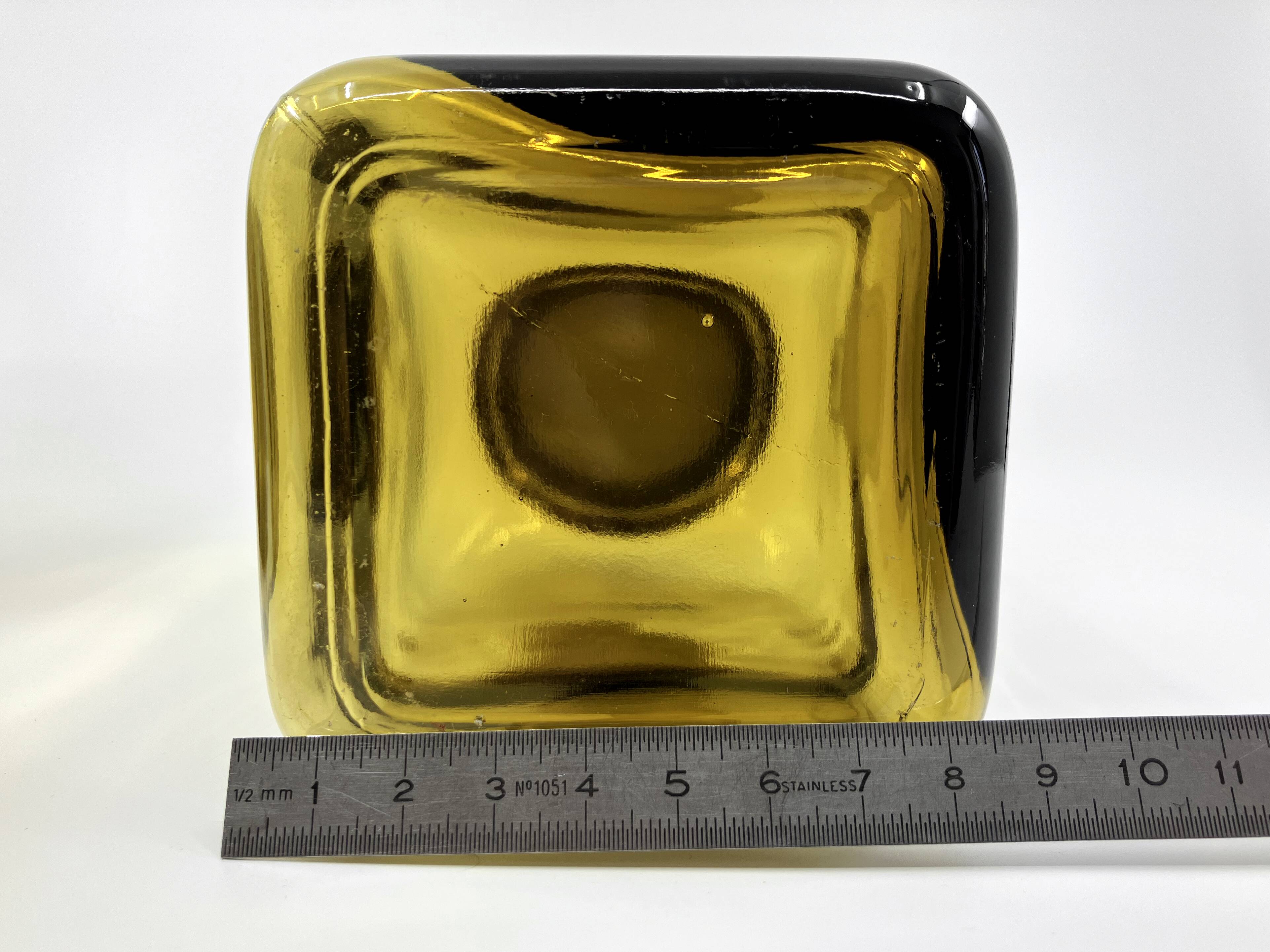 3 molded amber glass pharmacy bottles • Bakelite stoppers • 1950