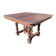 Square wooden table in Henri II style.