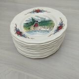 12 plates of the Obernai earthenware décor service signed Henri Loux