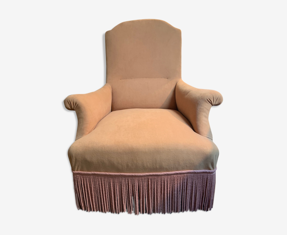 fauteuil crapaud en velours jaune et passementerie rose