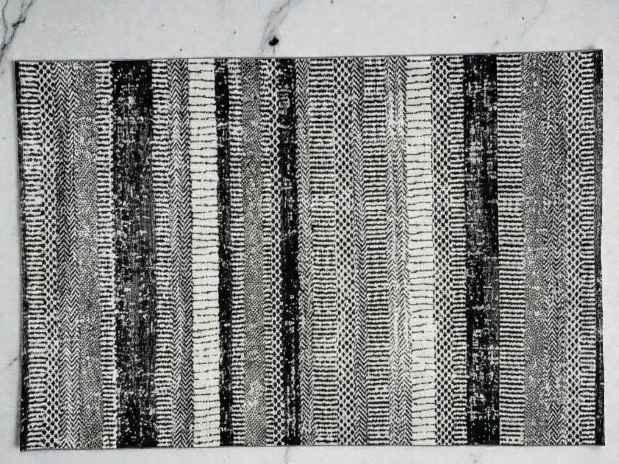Modern Chic Black and Grey Patterned Rug