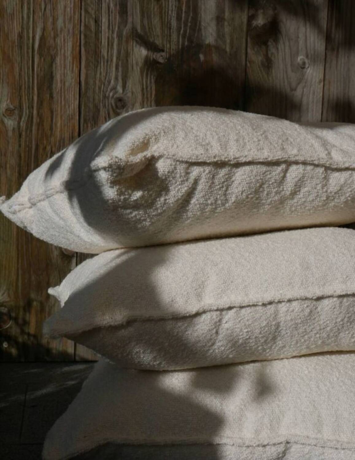 Coussin bouclette blanc cassé