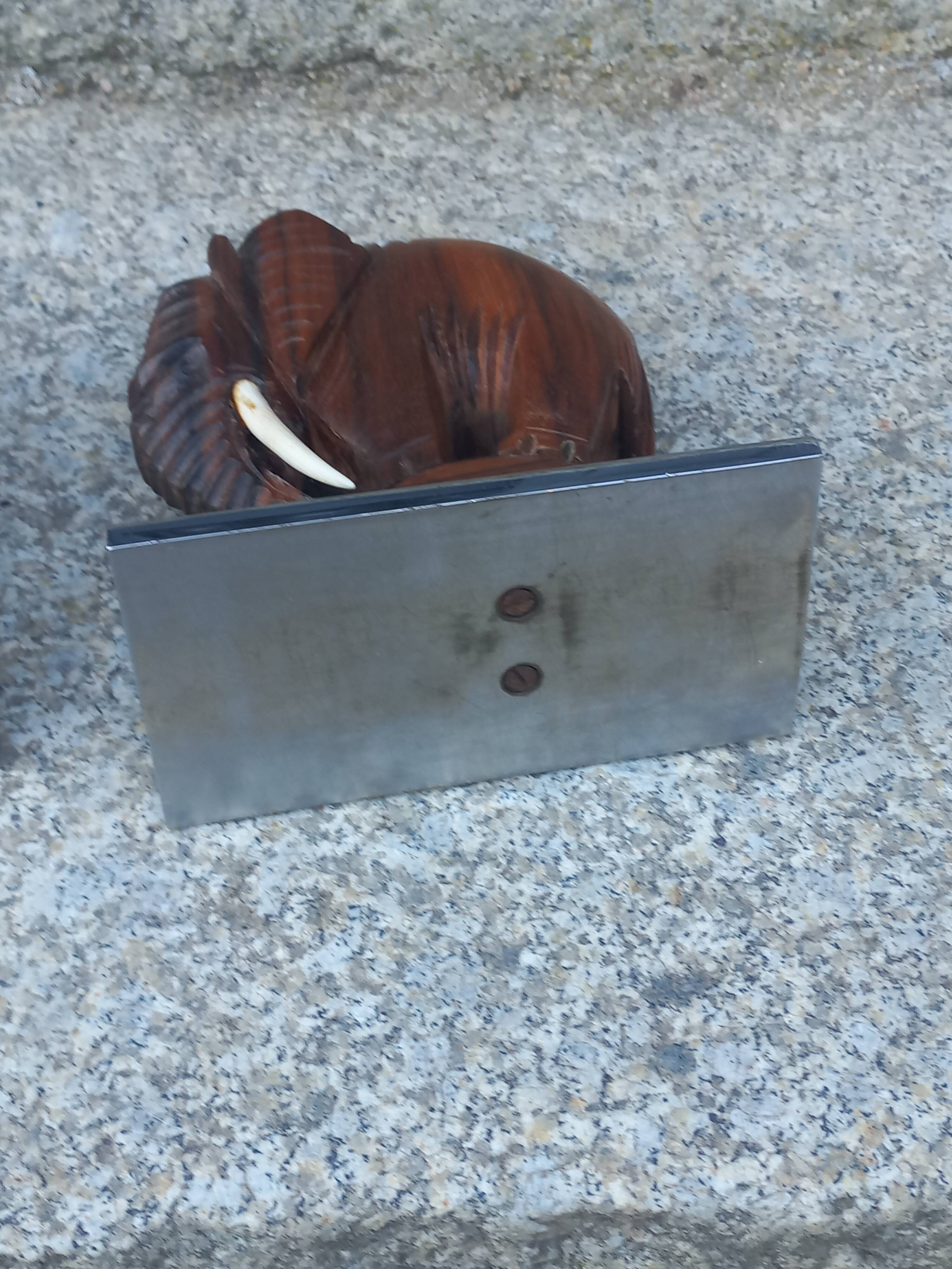 Pair of Art Deco elephant bookends in rosewood with chrome base.