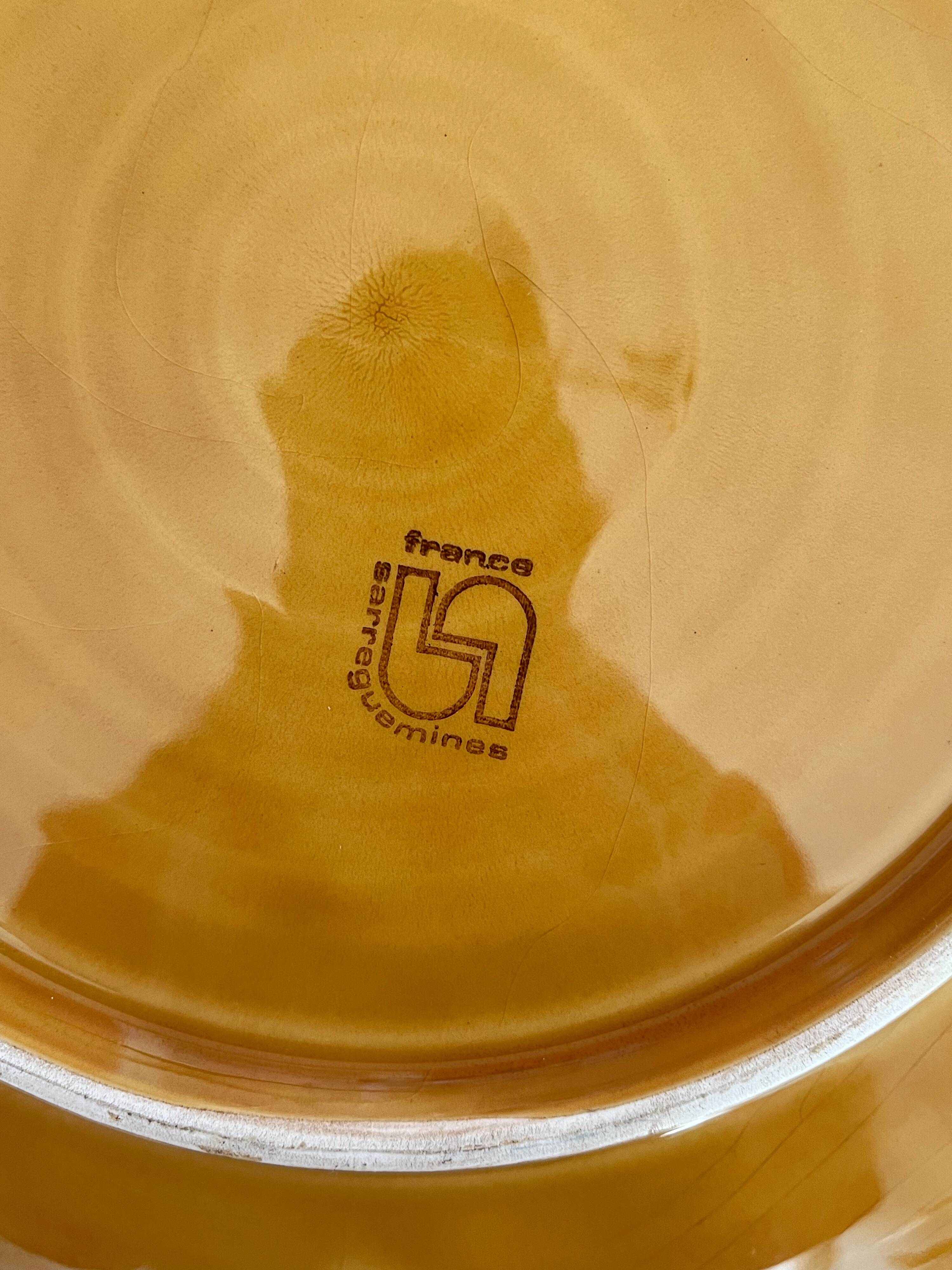 Round earthenware dish decorated with fruit in Sarreguemines slipware