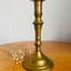 Old brass torch candle holder