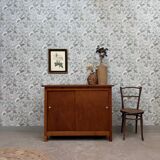 Vintage sideboard with sliding doors