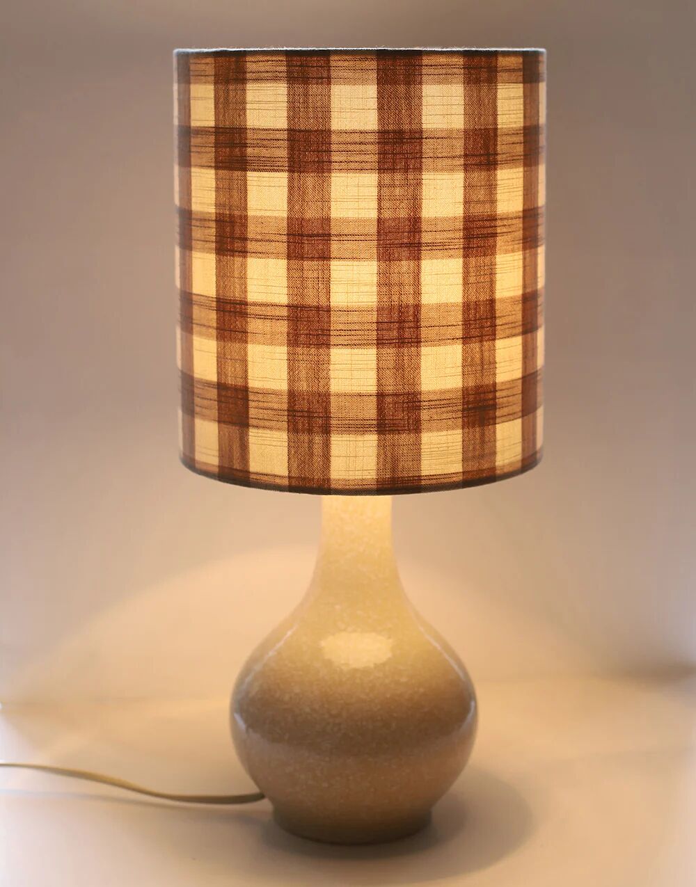 Vintage table lamp, 1950s ceramic base and beige gingham shade.