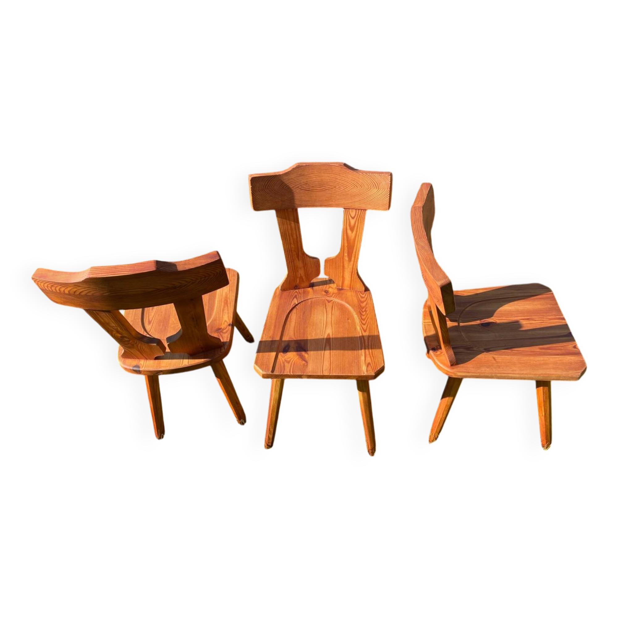 Three solid wood chairs