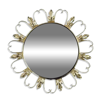 Miroir rond sur cadre laiton à volutes