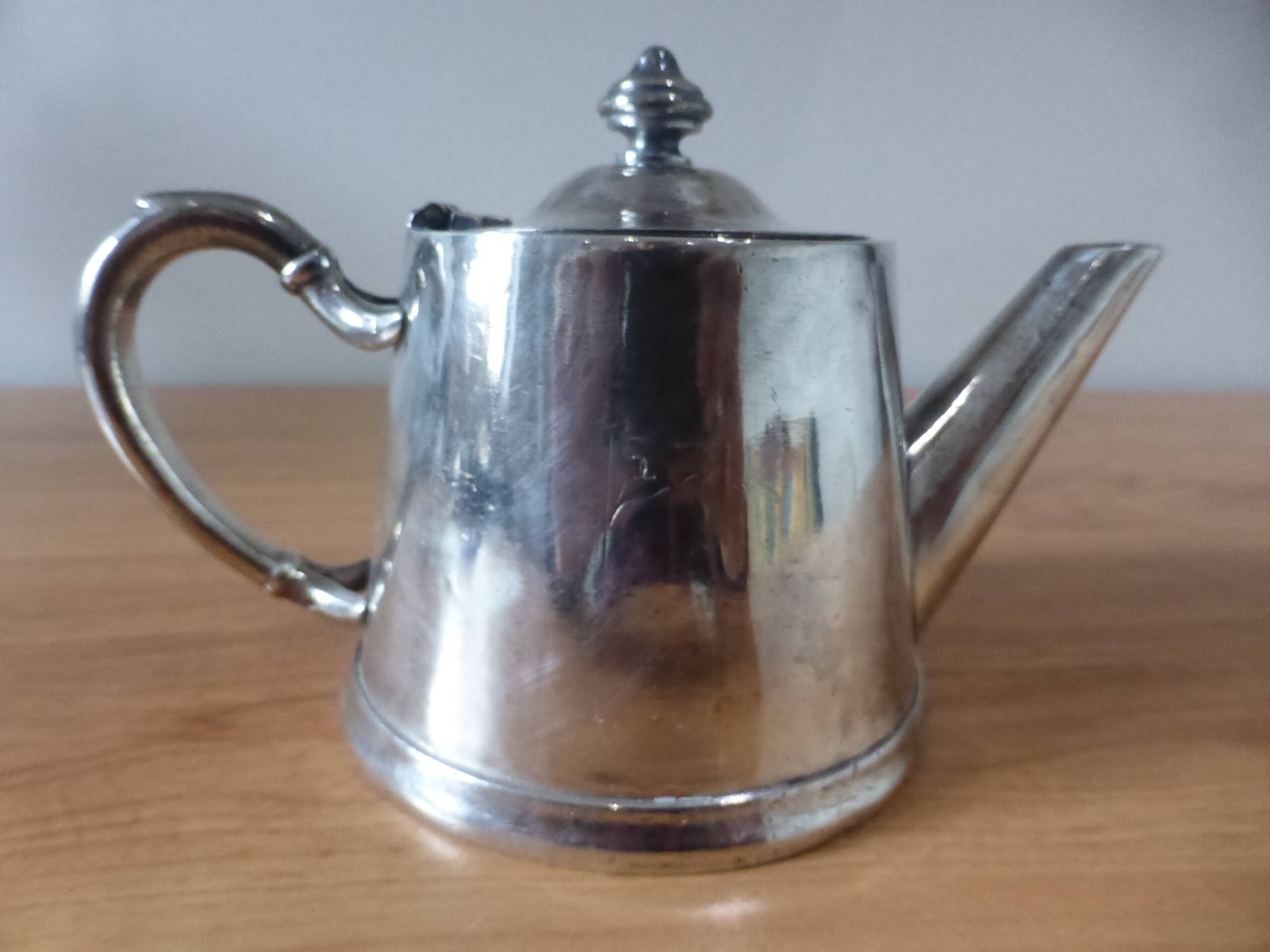 Vintage silver-plated metal teapot, pottery style