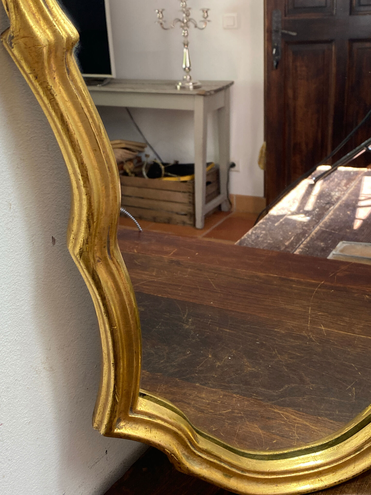 Large baroque mirror in gilded wood