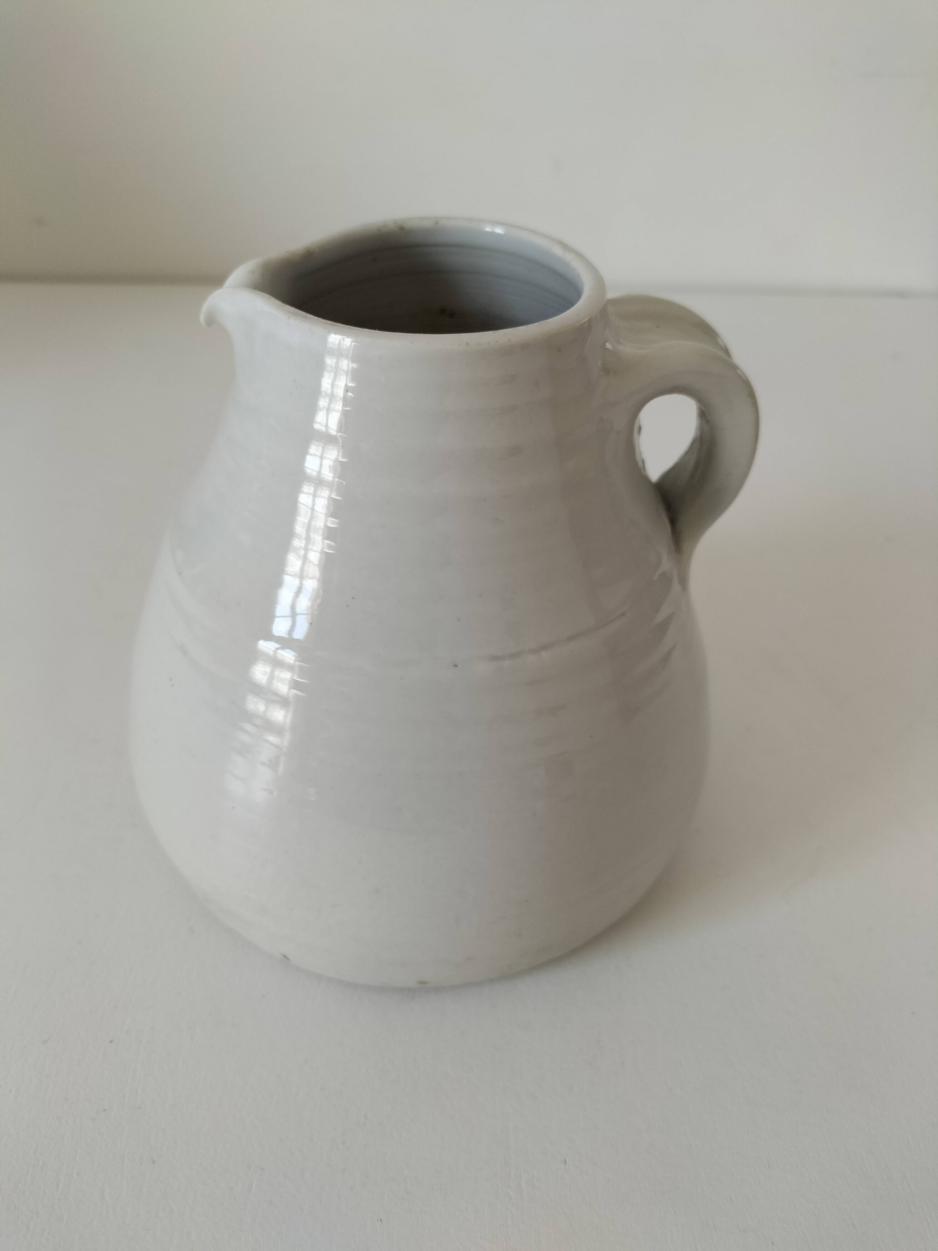 Hand-thrown white stoneware pitcher – signed artisanal ceramic