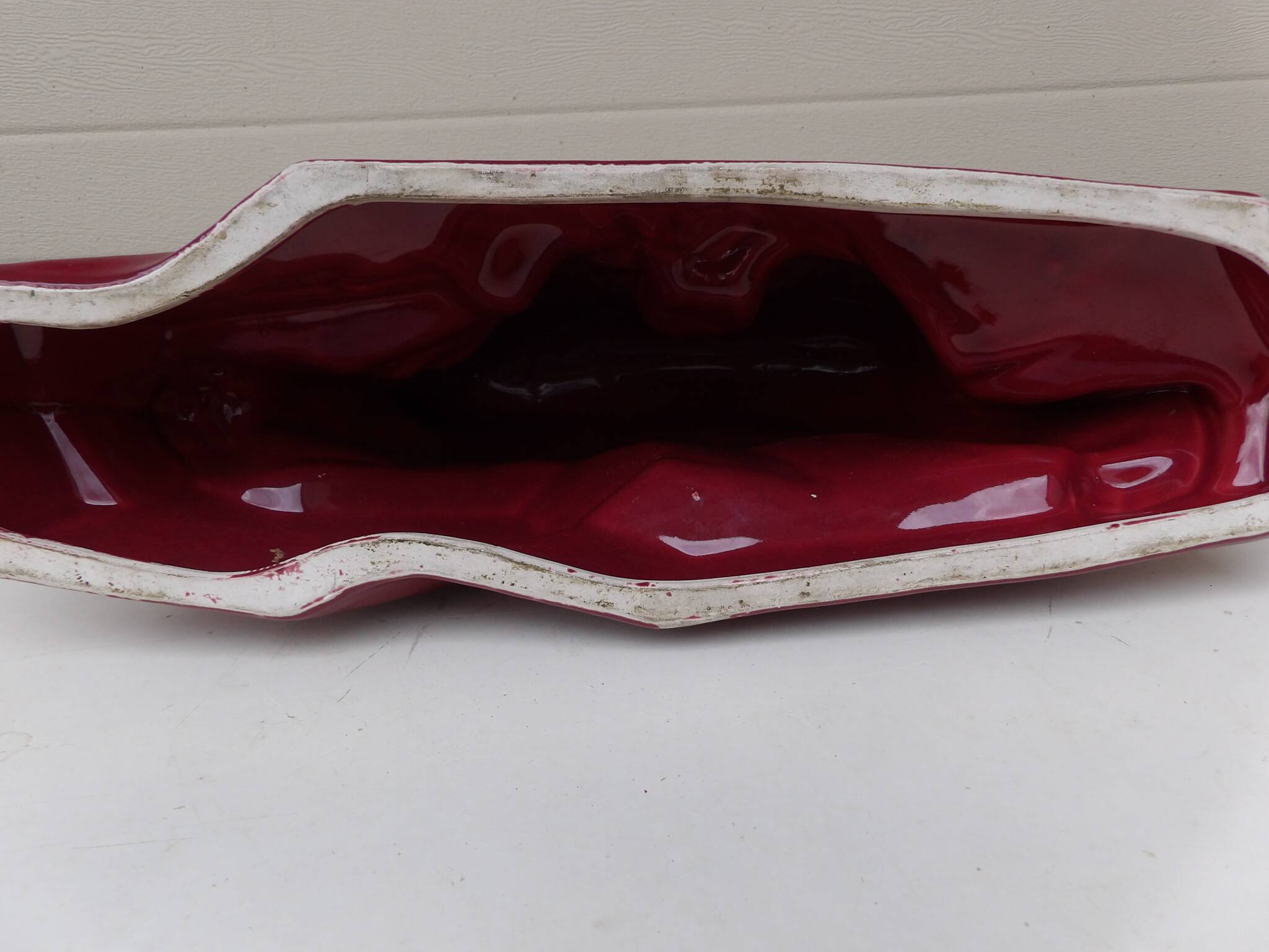 red ceramic ours