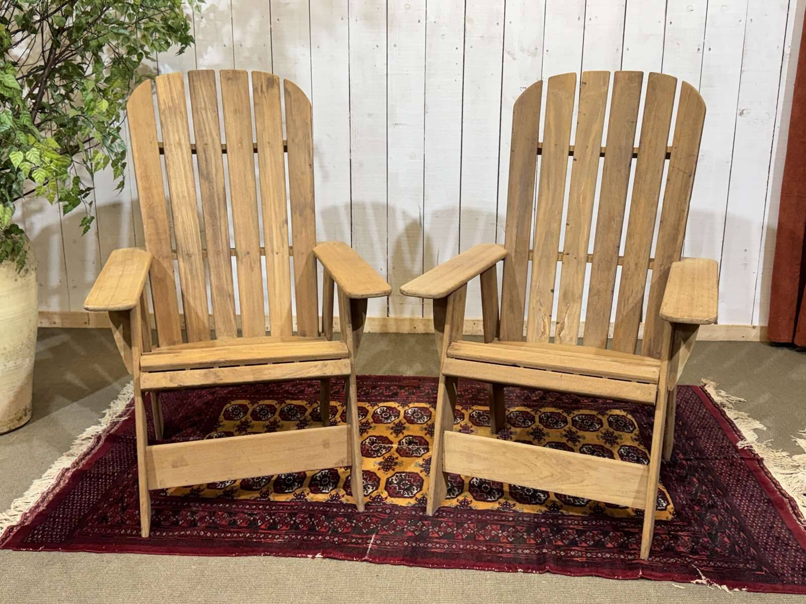 Pair of Indian teak armchairs