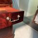 Antique mahogany secretary, upholstered flap and interior storage