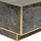 Marble glass coffee table with "solar eruption" decor.