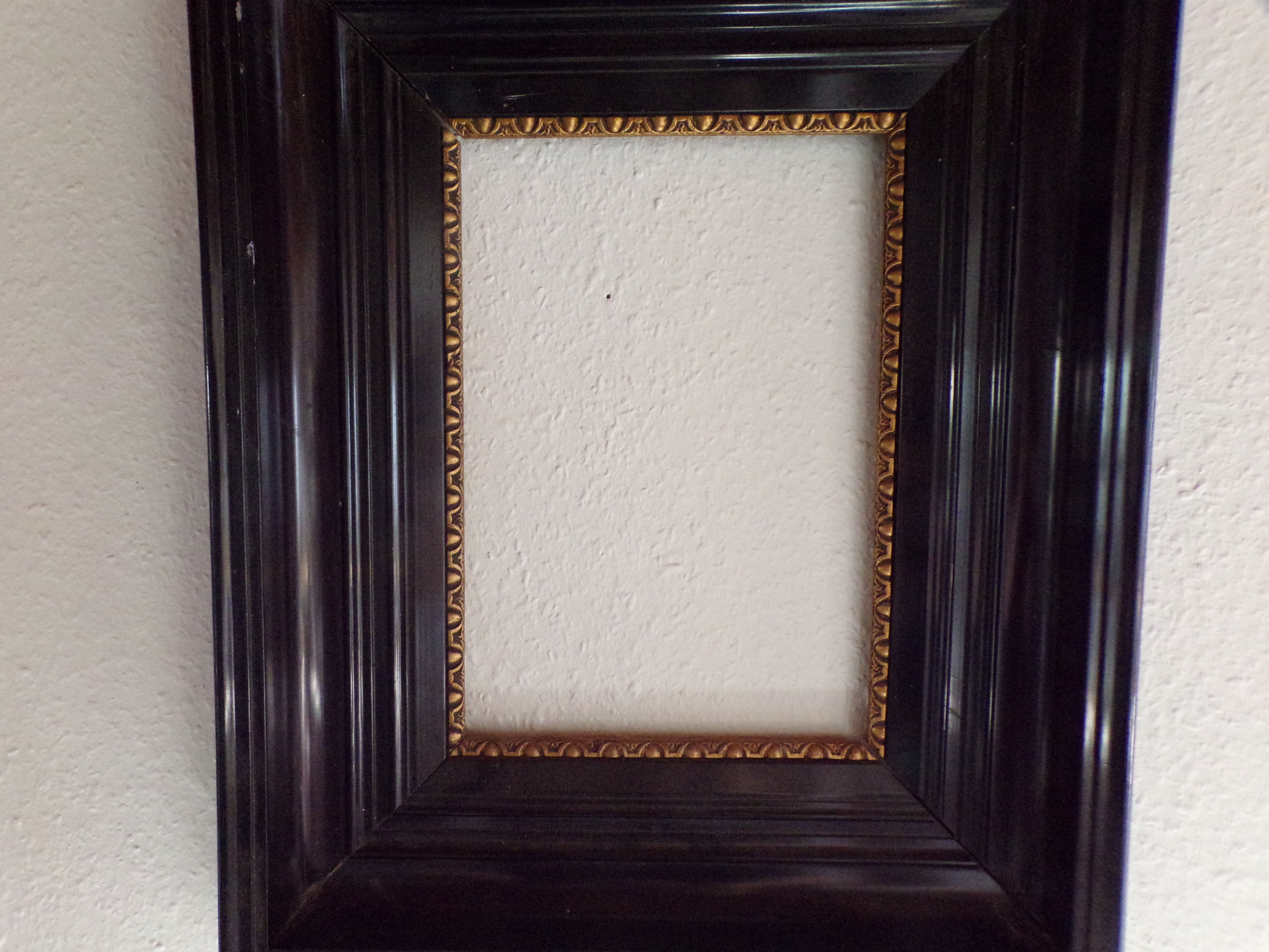Old frame blackened wood stucco for painting or photo