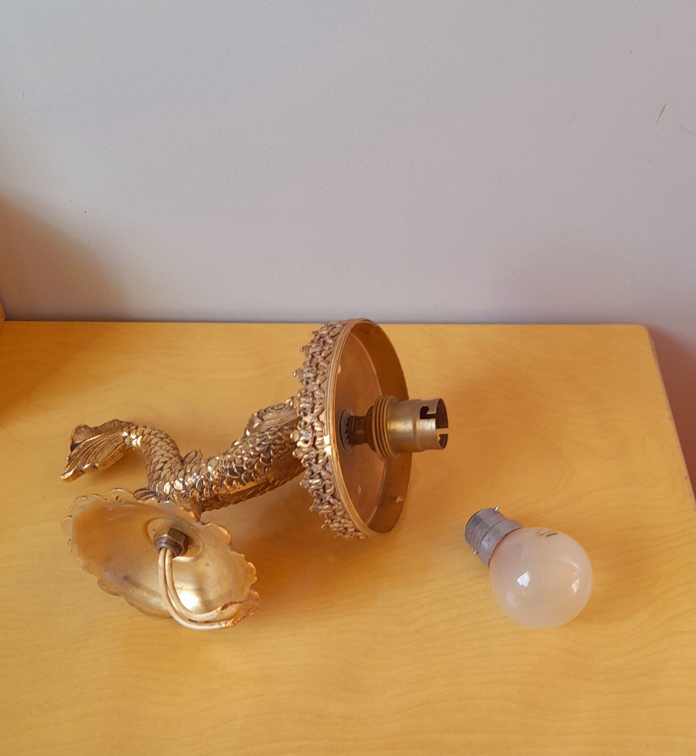 Pair of dolphin brass sconces