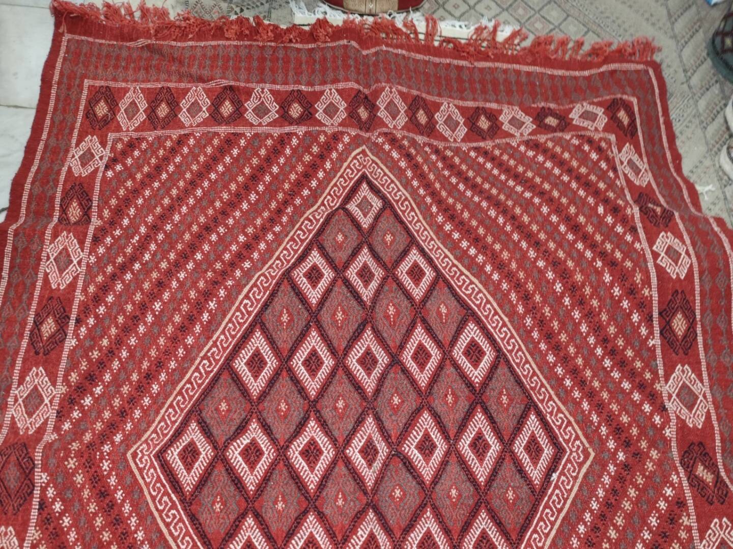 Hand-woven red margoum carpet