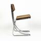 Ensemble de 4 chaises vintage à accoudoirs en chrome, bois et paille de Vienne, années 1970.