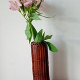 Japanese vase made of woven bamboo. Ikebana