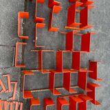 Large modular bookcase shelf in orange thermoformed wood circa 1970