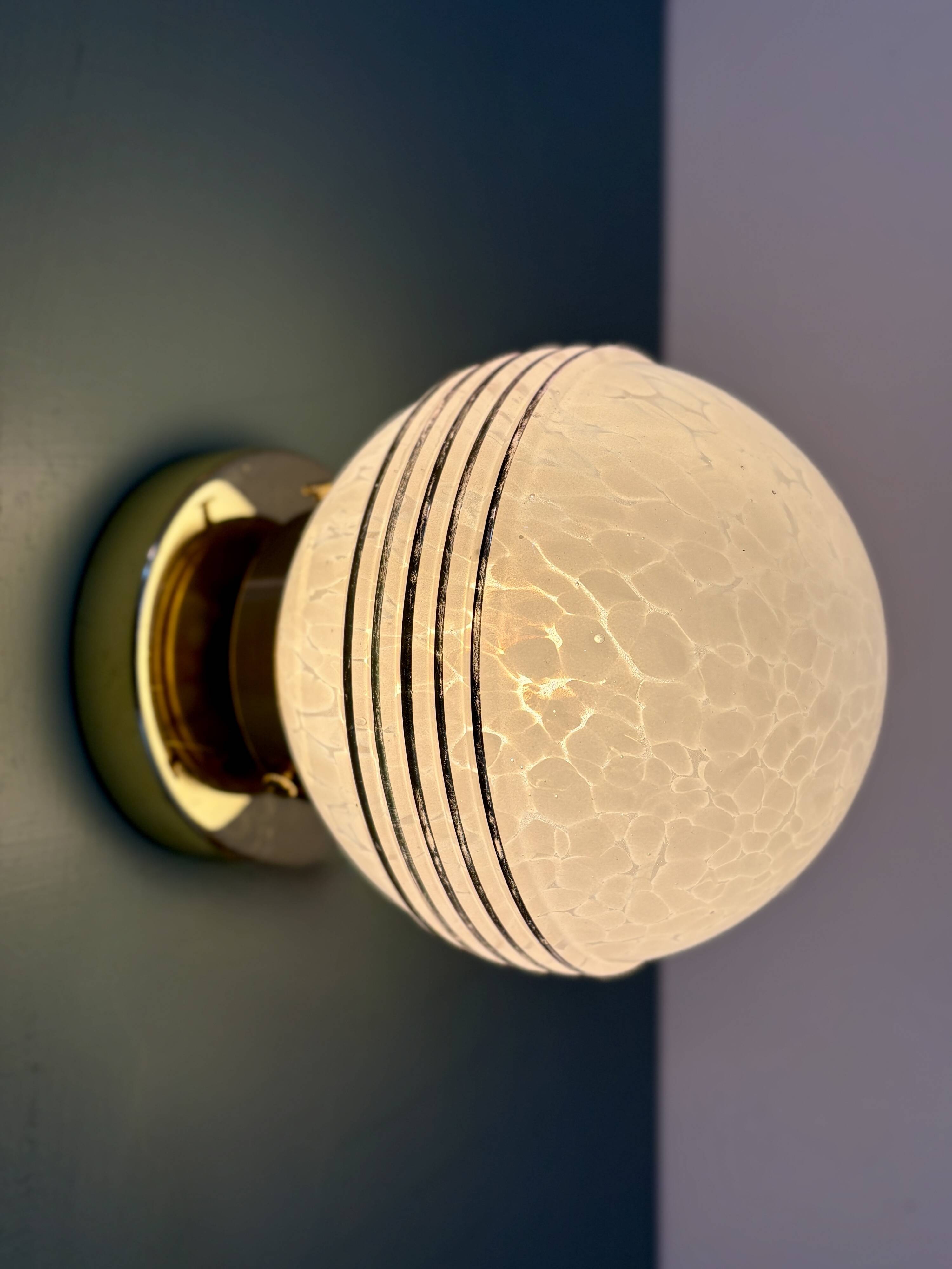 Vintage glass globe wall or ceiling light in white and gold from Clichy.